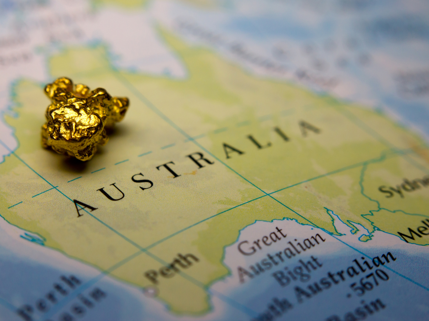 map of Australia with a gold nugget on it 