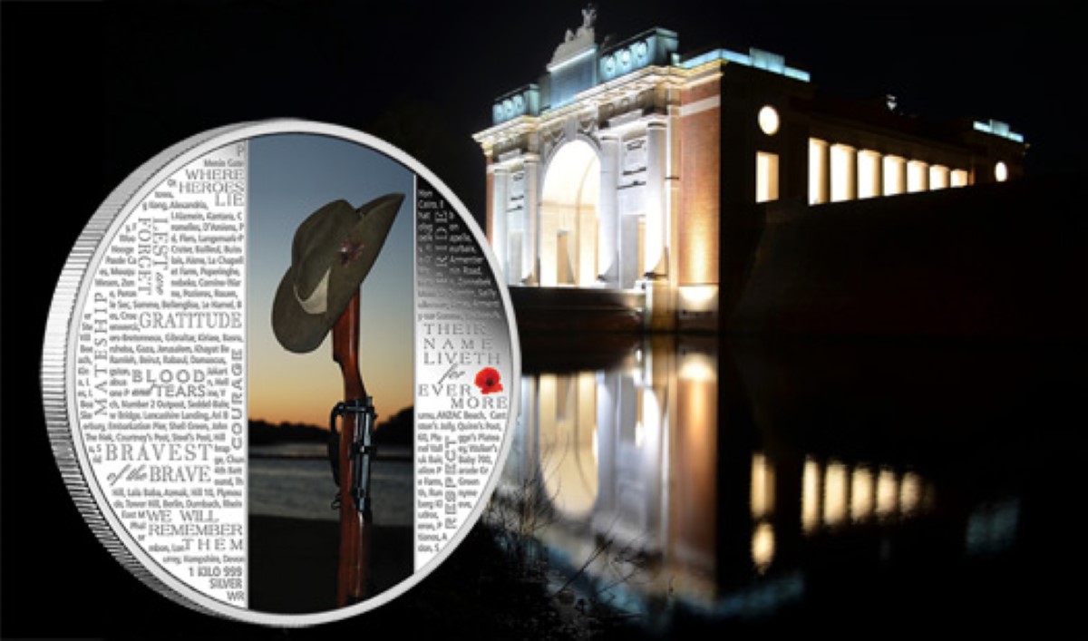 a silver coin with the Menin Gate in the background