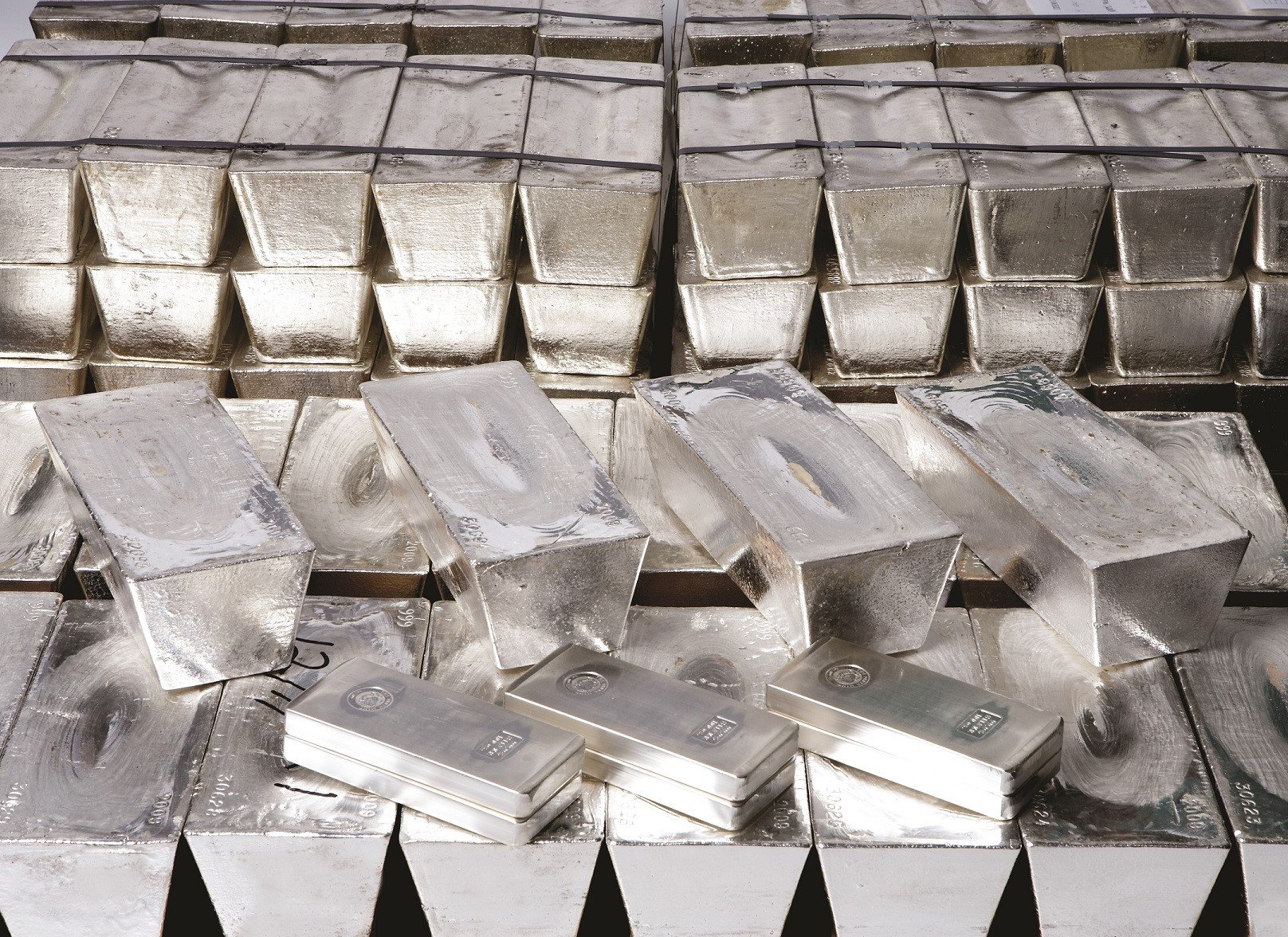 stacks of varying sized Perth Mint silver bullion bars