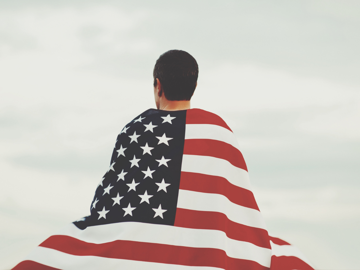 a man wearing an American flag 