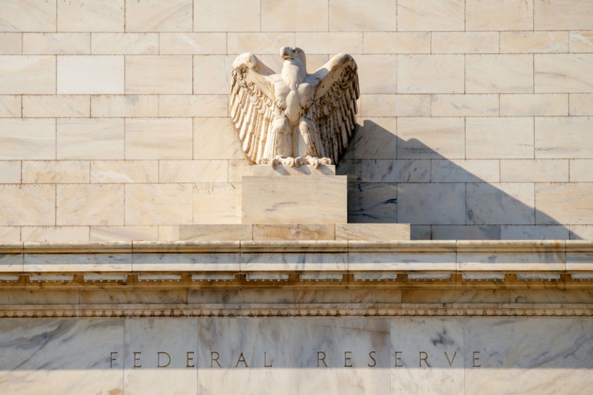 the federal reserve building with statue of a bald eagle