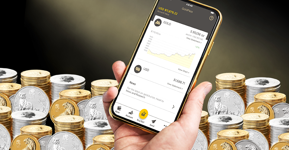 The Perth Mint Gold and Silver Bullion Coins with a hand holding an iphone with the GoldPass app loaded on the screen