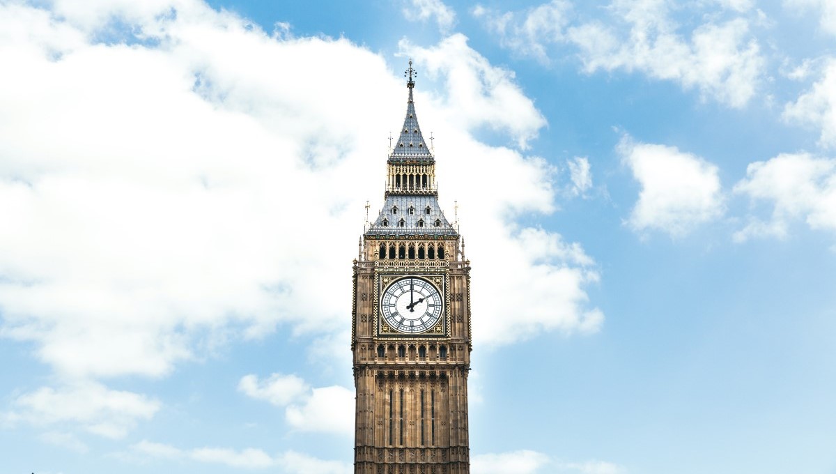 Big Ben the clock tower against a blue sky with clouds