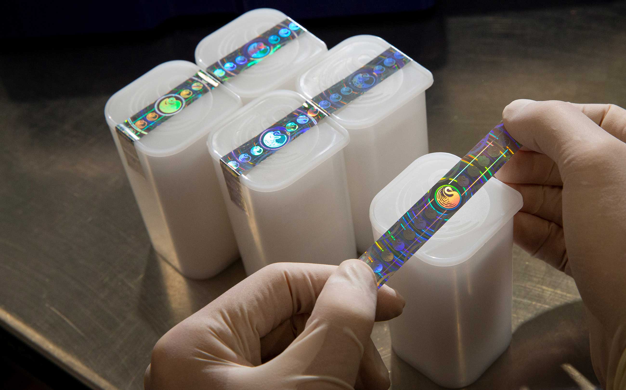 Packaging coins at The Perth Mint ready for shipping.