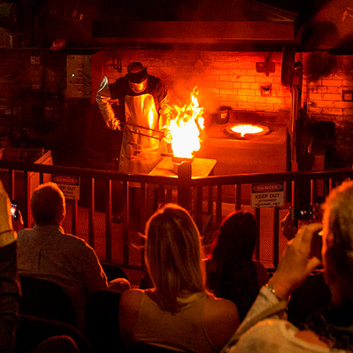 Gold pour with crowd watching at The Perth Mint.