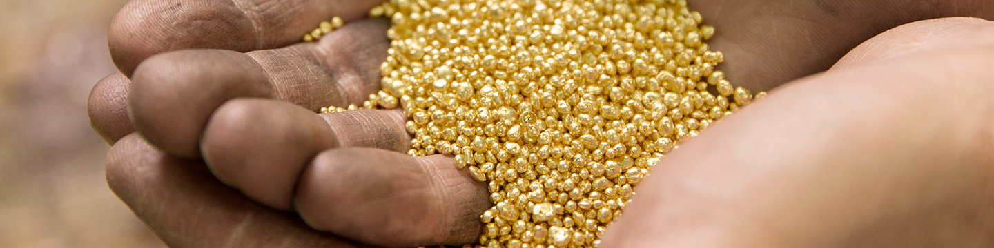 hero responsible metals Gold granules in hands 1200 x 300