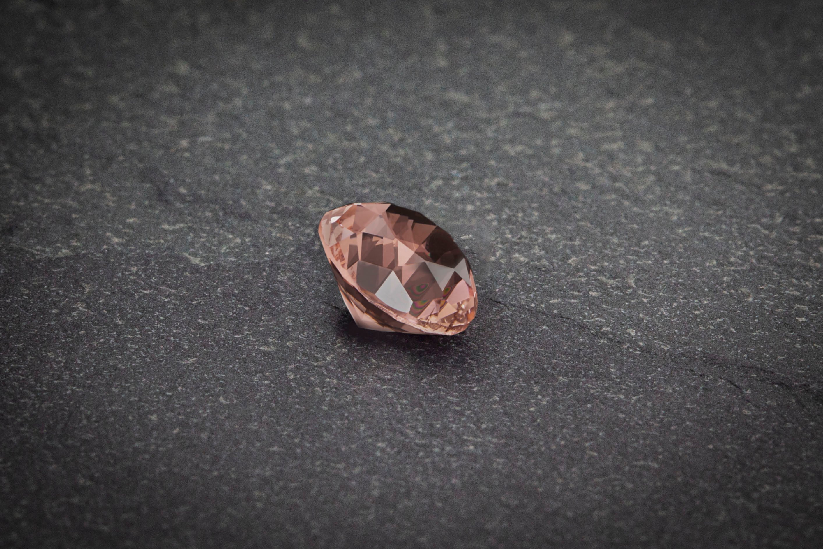 morganite on grey textured background