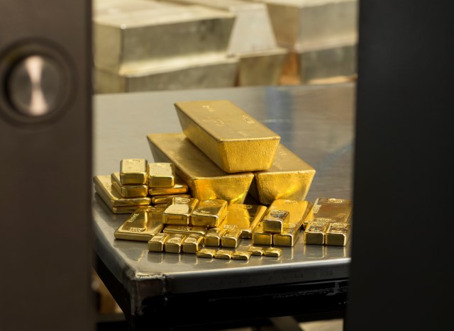 a stack of Perth Mint gold bars in various sizes