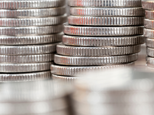 a stack of silver coins